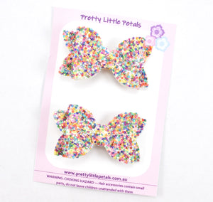 Annabelle - rainbow glitter piggytail bows