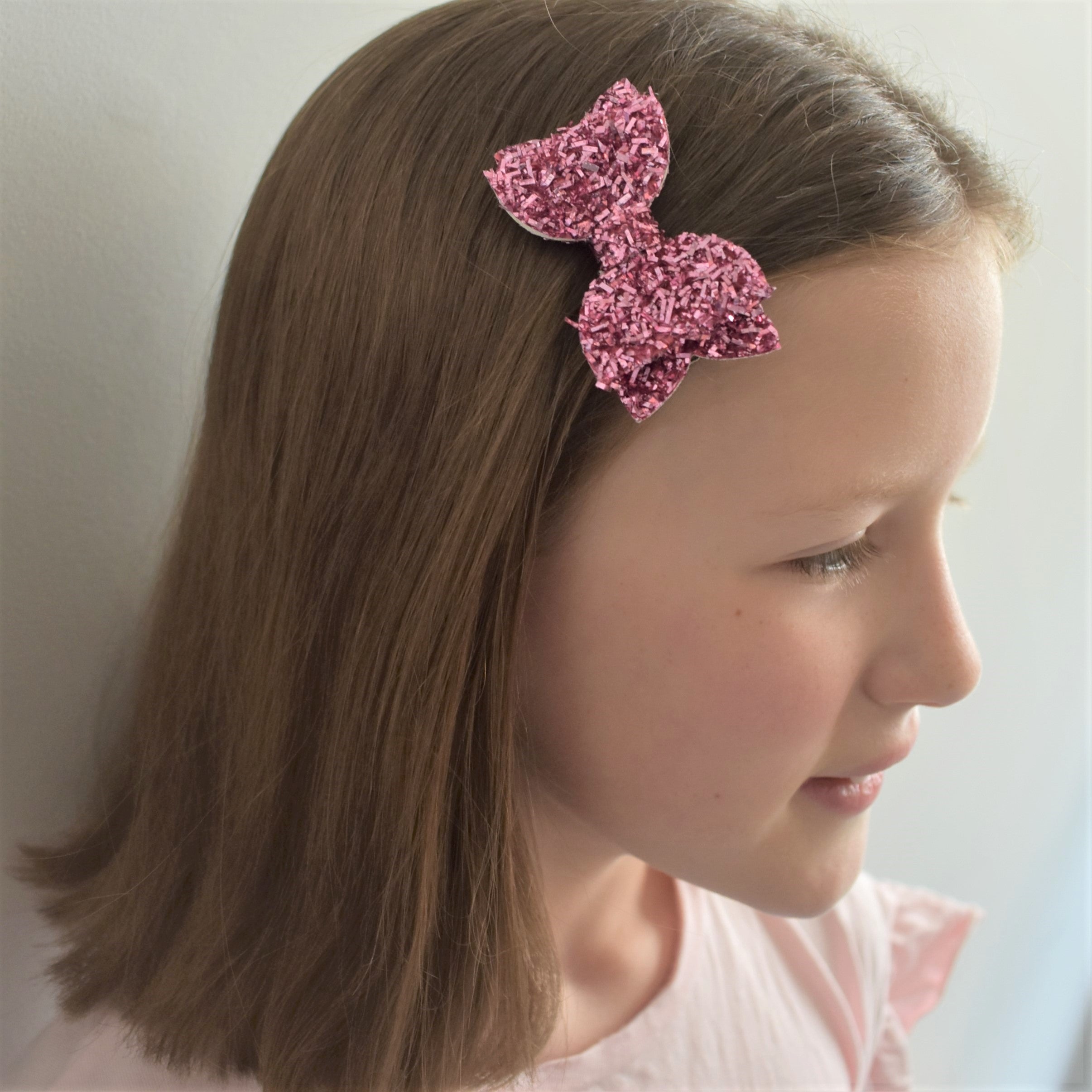Annabelle Bow Hair Clip - pink tinsel